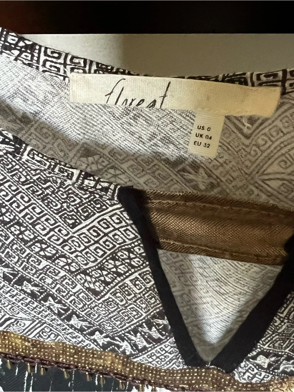 Free People Black and Cream Printed Sleeveless Blouse sequined in front.